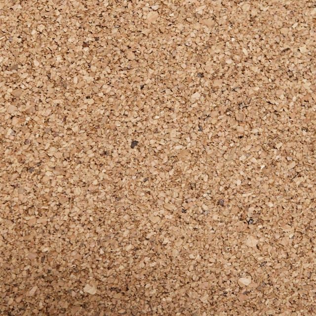 Nahaufnahme einer Korkoberfläche mit feiner Granulatstruktur